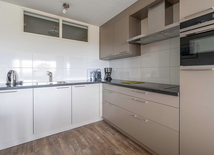 Gemuetliche Sitzecke im Apartment Juliana 096 Island and Sea View, De Koog, Texel mit Blick auf die Watteninseln.