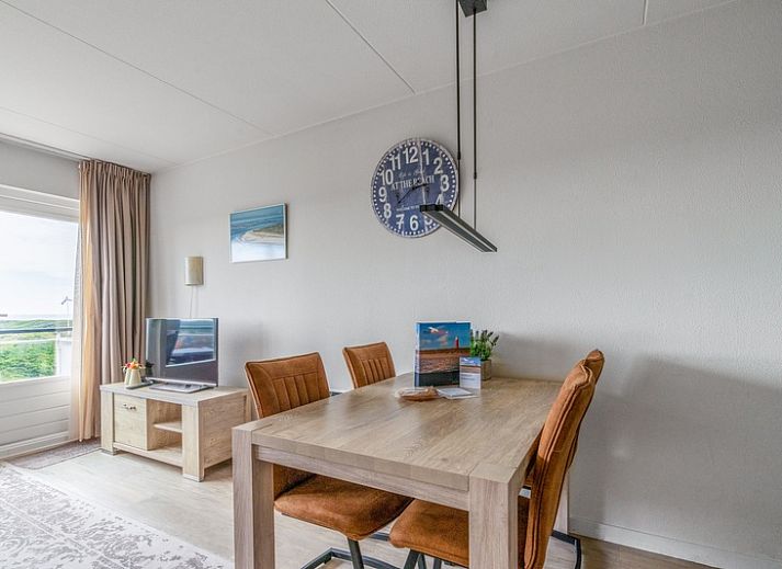 Bright living space of Apartment Juliana 138 in De Koog, Texel, with sea view.