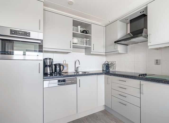 Bright living space of Apartment Juliana 138 in De Koog, Texel, with sea view.