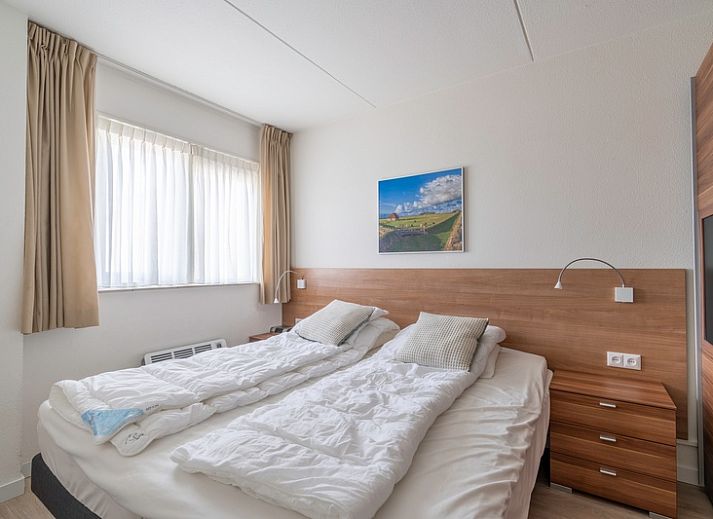 Bright living space of Apartment Juliana 138 in De Koog, Texel, with sea view.