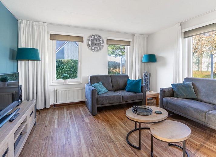 Vacation home Honeysuckle 47 in De Koog, Texel with beautiful waterfront garden for relaxation.