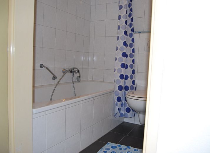 Spacious terrace of Apartment Dorpsstraat 245 in De Koog, Texel overlooking nature.