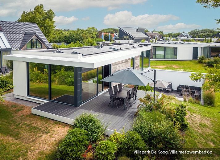 Luxury family villa with pool in De Koog, Texel. Modern architecture surrounded by lush nature on the Wadden Islands.