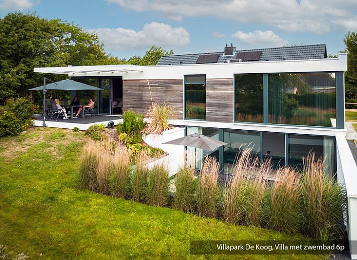 Luxury family villa with pool in De Koog, Texel. Modern architecture surrounded by lush nature on the Wadden Islands.