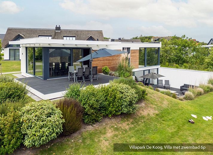 Luxury family villa with pool in De Koog, Texel. Modern architecture surrounded by lush nature on the Wadden Islands.
