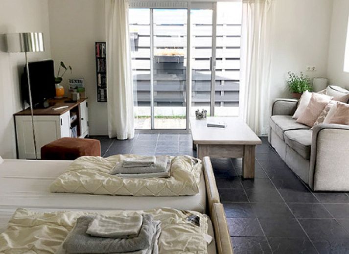 Charming terrace at Zomerhuisje Schoo in De Koog, Texel, vacation home on the Wadden Islands.