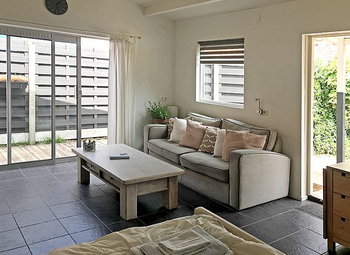 Charming terrace at Zomerhuisje Schoo in De Koog, Texel, vacation home on the Wadden Islands.