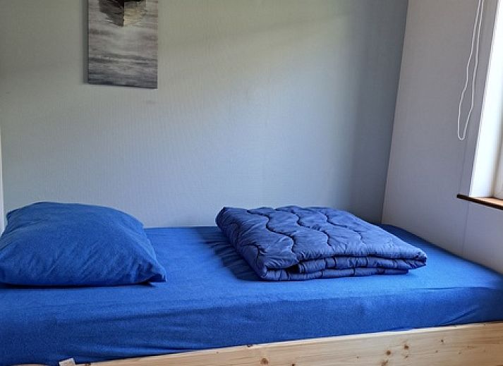 Vacation home Hoog Koog 10 in Bungalowpark Hoog Koog, De Koog, Texel with spacious outdoor area and seating.