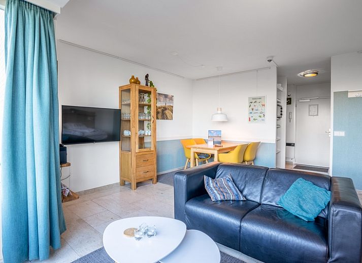 Cozy living room in Apartment Juliana 068 Island and Sea View, De Koog, Texel with beautiful views of the dunes.