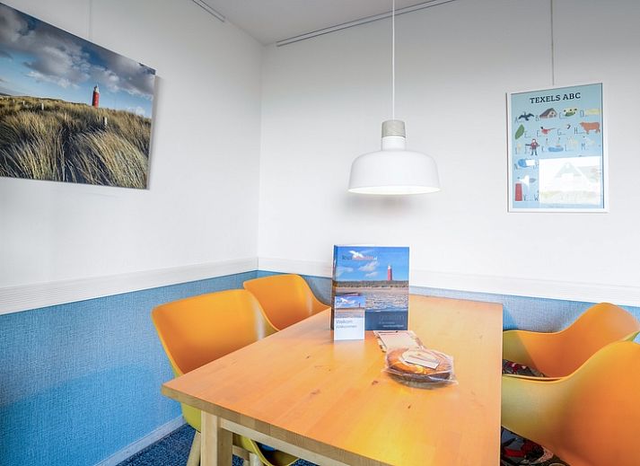 Cozy living room in Apartment Juliana 068 Island and Sea View, De Koog, Texel with beautiful views of the dunes.