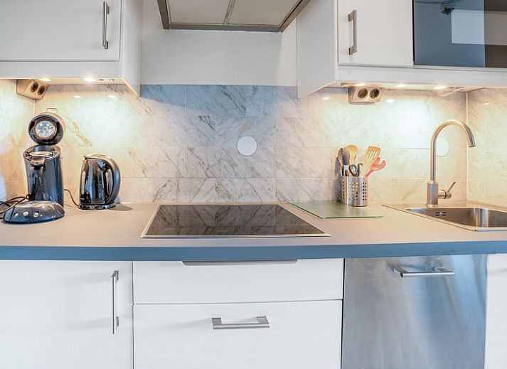 Bright interior space of Apartment Juliana 068 Island and Sea View, De Koog, Texel with comfortable seating.