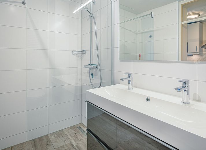 Bright interior space of Apartment Juliana 068 Island and Sea View, De Koog, Texel with comfortable seating.