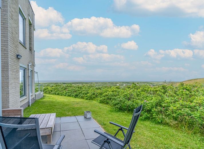 Bright interior space of Apartment Juliana 068 Island and Sea View, De Koog, Texel with comfortable seating.