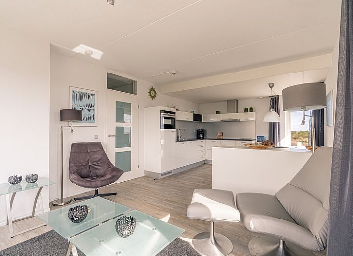 Helles Wohnzimmer von Apartment Juliana 132 Eilandzicht in De Koog, Texel mit Panoramablick.