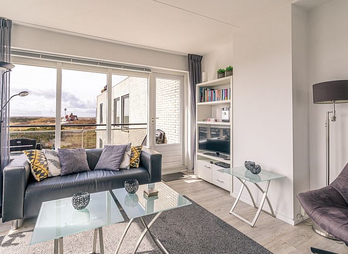 Helles Wohnzimmer von Apartment Juliana 132 Eilandzicht in De Koog, Texel mit Panoramablick.