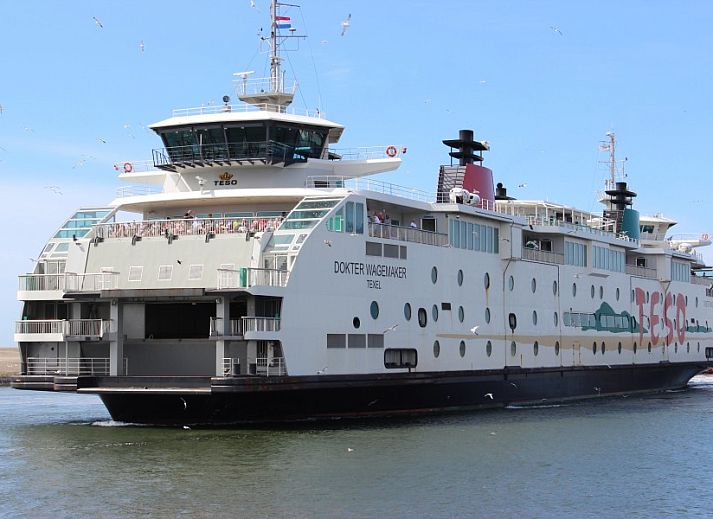 Esszimmer mit Holzofen im 6-Personen-Ferienhaus mit Sauna, De Koog, Texel