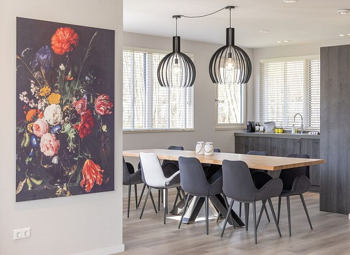 Villa 8 in De Koog, Texel, offers a spacious vacation home with sunny terrace and green garden, ideal for a relaxing stay on the Wadden Islands.