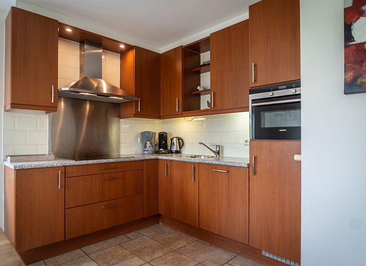 Villa 304 in De Koog, Texel with sunny terrace and green garden, perfect vacation home on the Wadden Islands.