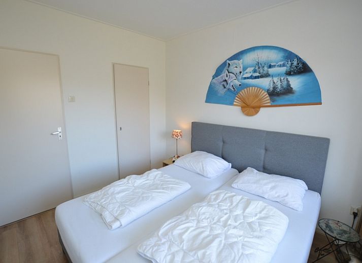 Interior of Apartment Kerckeland 50, De Koog, Texel with modern furnishings and spacious seating area.