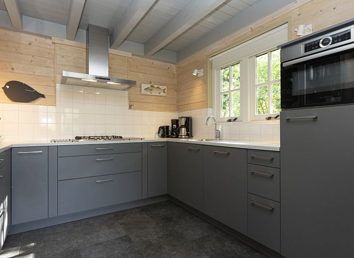 Cozy living room in Het Boshuis, Holiday Park Het Oude Dijkje, De Koog, Texel with modern furnishings.