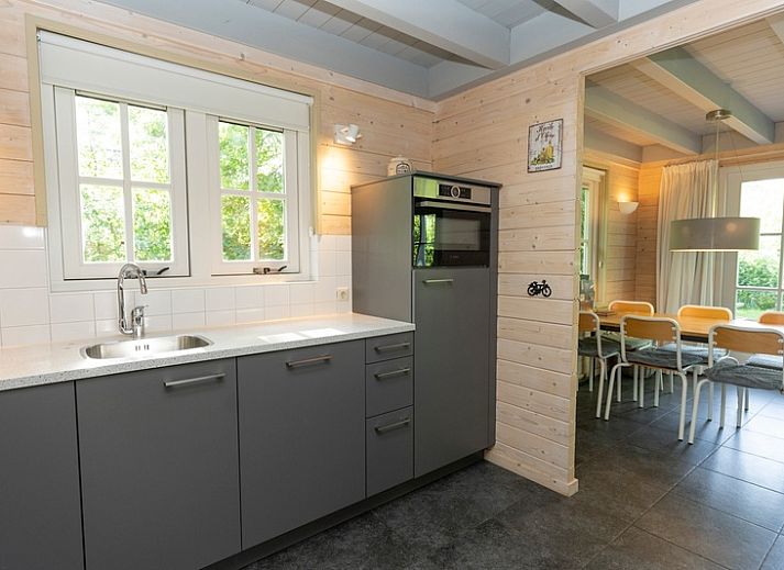 Cozy living room in Het Boshuis, Holiday Park Het Oude Dijkje, De Koog, Texel with modern furnishings.