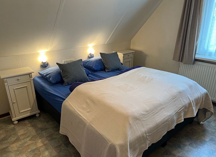 Cozy indoor area of Landgoed Springtij - Koetshuis 2, vacation home in De Koog, Texel with comfortable seating area and modern amenities.