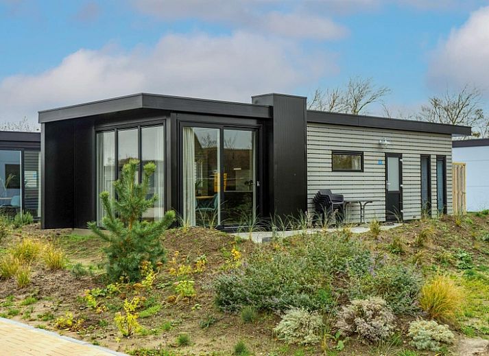 Ferienhaus Pavillion 4 in De Koog, Texel, mit moderner Architektur und gruener Umgebung.