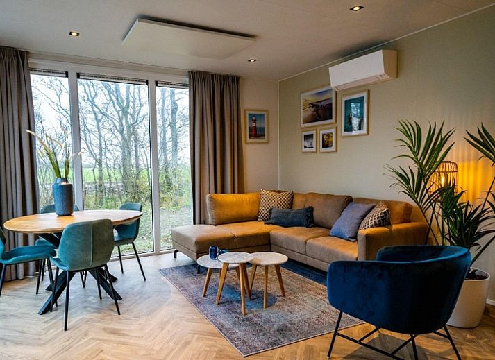 Ferienhaus Pavillion 4 in De Koog, Texel, mit moderner Architektur und gruener Umgebung.