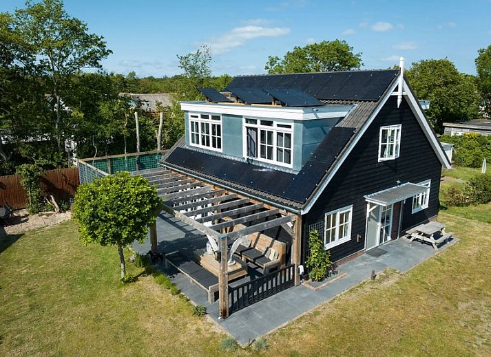 Charmant vakantiehuis Residence Rustiek in De Koog, Texel met zonnige tuin.