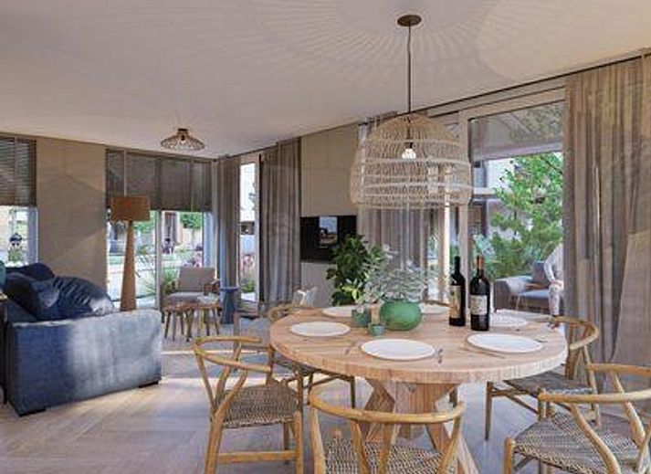 Duinvilla Wellness 6 in De Koog, Texel, modern vacation home with wooden facade and veranda.