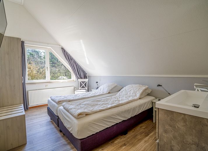Gemuetliches Wohnzimmer im Ferienhaus Kamperfoelie 91 mit Sauna, De Koog, Texel, ideal fuer einen entspannten Aufenthalt auf den Watteninseln.