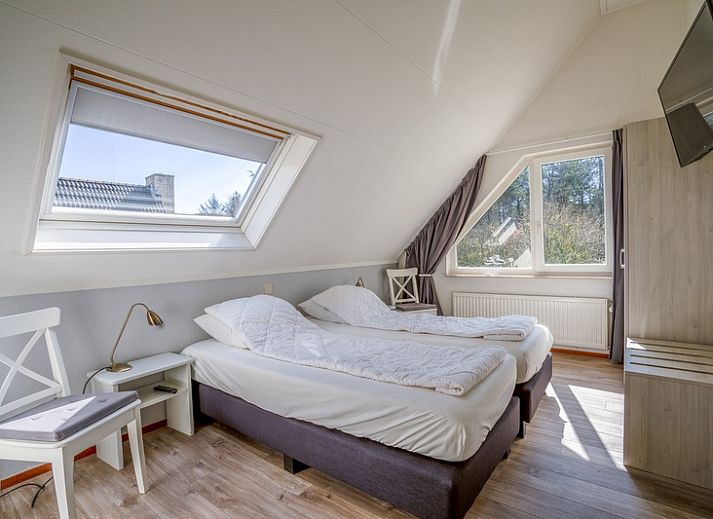 Gemuetliches Wohnzimmer im Ferienhaus Kamperfoelie 91 mit Sauna, De Koog, Texel, ideal fuer einen entspannten Aufenthalt auf den Watteninseln.