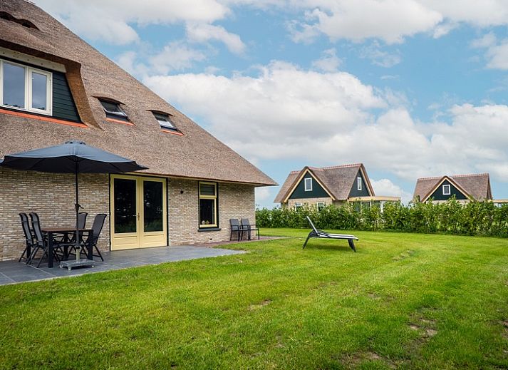 Vakantiehuis in De Koog op Texel met rieten dak en ruime tuin, Waddeneilanden.