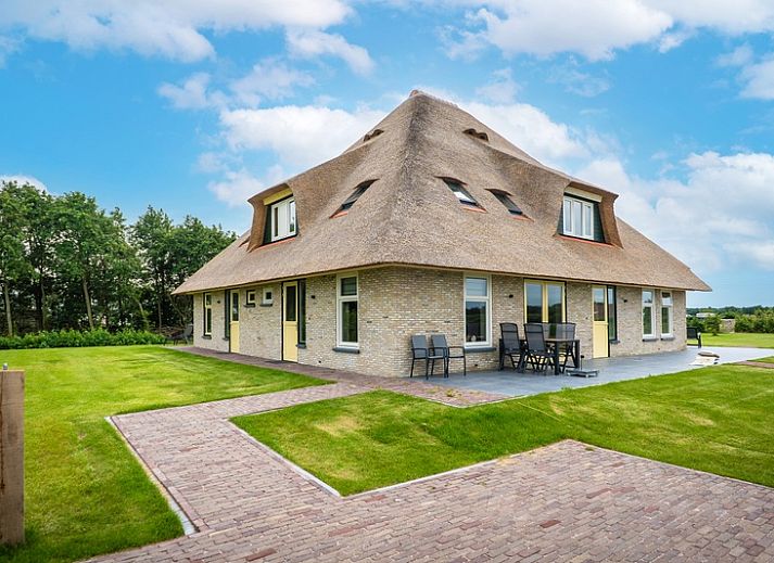 Vakantiehuis in De Koog op Texel met rieten dak en ruime tuin, Waddeneilanden.