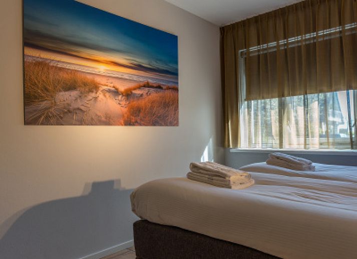 Zilte Bries vakantiehuis op Texel met charmant pad naar het terras in De Koog.