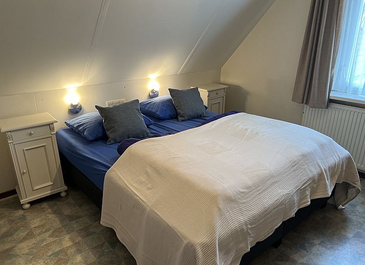 Gemuetliches Wohnzimmer im Koetshuis 2, Ferienhaus De Koog, Texel mit bequemen Sofas.