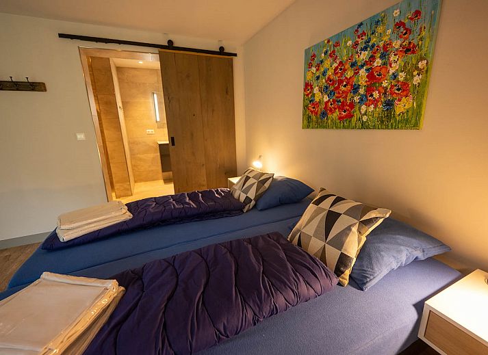 Rustiek vakantiehuis 't Stulpje in De Koog Texel met houten accenten.