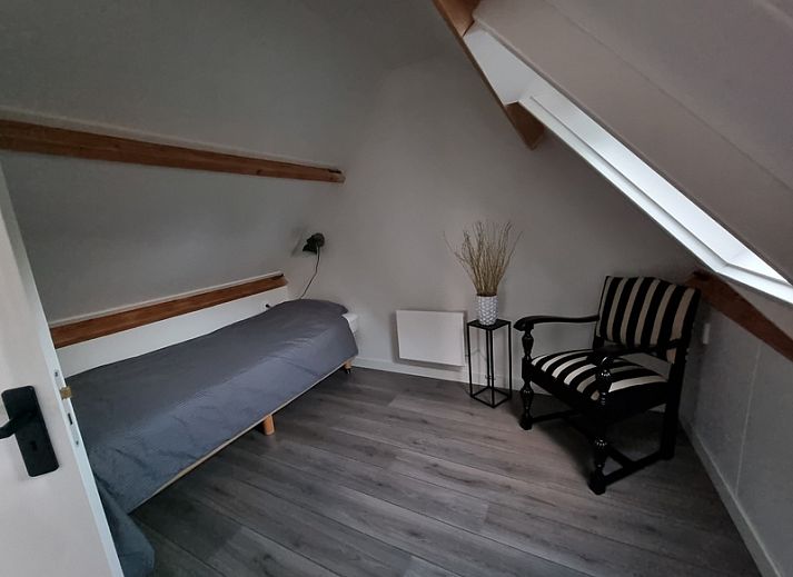 Hofstede Bargen vakantiehuis in De Waal Texel met charmante gevel en zonnige voortuin.