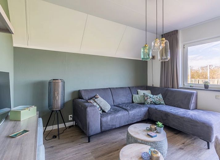 Ferienhaus in De Waal, Texel, mit grossem Garten und moderner Architektur, ideal fuer einen entspannten Aufenthalt auf den Watteninseln.