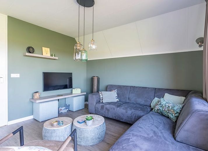 Ferienhaus in De Waal, Texel, mit grossem Garten und moderner Architektur, ideal fuer einen entspannten Aufenthalt auf den Watteninseln.