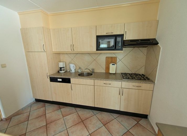 Bungalow De Boogerd in De Waal, Texel with spacious garden and terrace, ideal for a relaxing stay on the Wadden Islands.