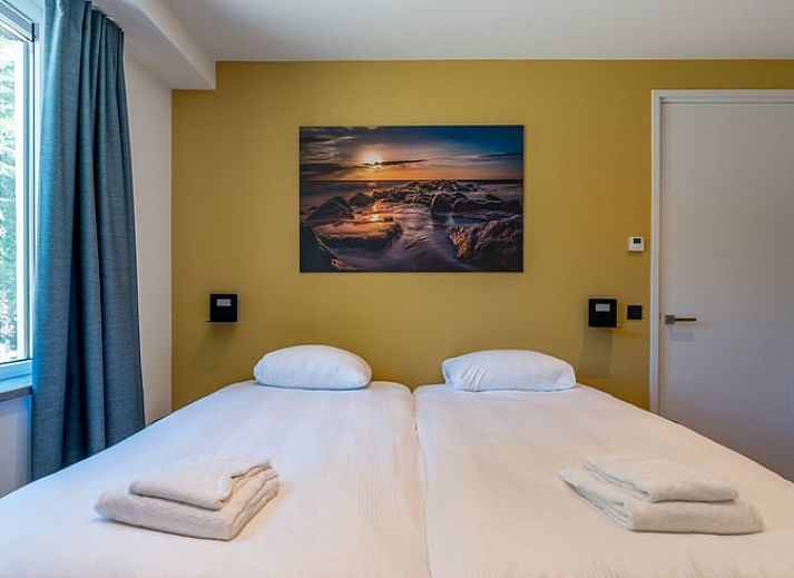 Aussenbereich des Ferienhauses in Den Burg, Texel, mit Blick auf die Natur.