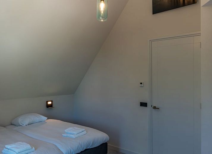 Aussenbereich des Ferienhauses in Den Burg, Texel, mit Blick auf die Natur.