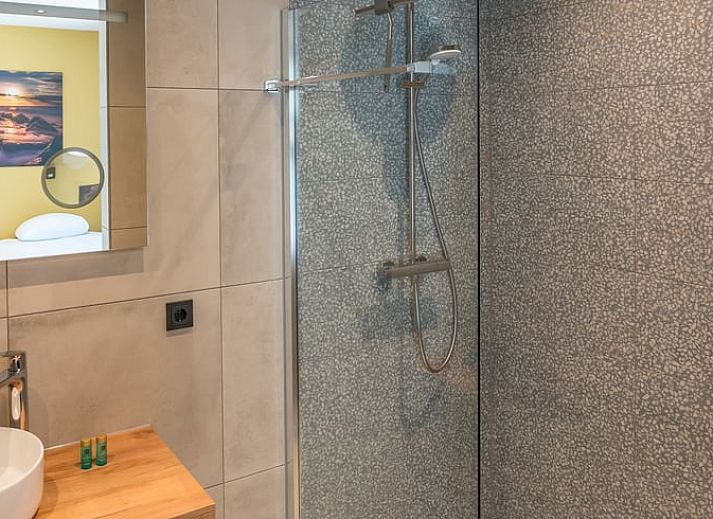 Aussenbereich des Ferienhauses in Den Burg, Texel, mit Blick auf die Natur.