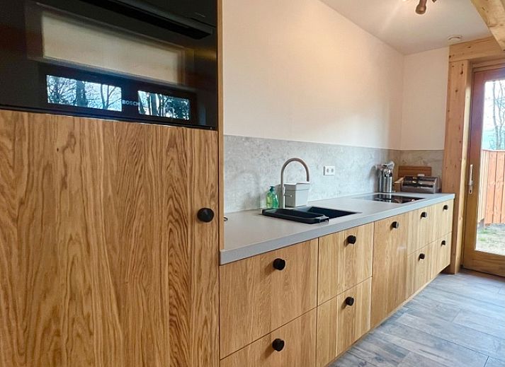 Bluehender Baum bei Hoeve Consensus Texel Ferienhaus in Den Burg, Watteninseln