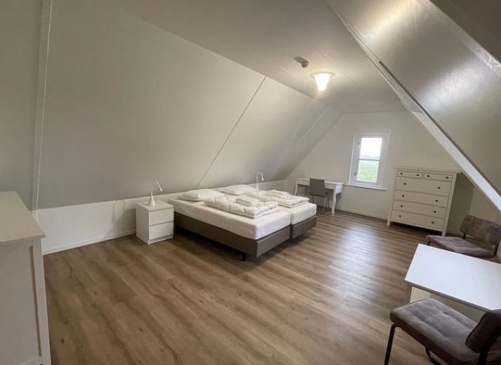 Bright and spacious living room in Cottage in Den Burg, Texel, perfect for relaxation.