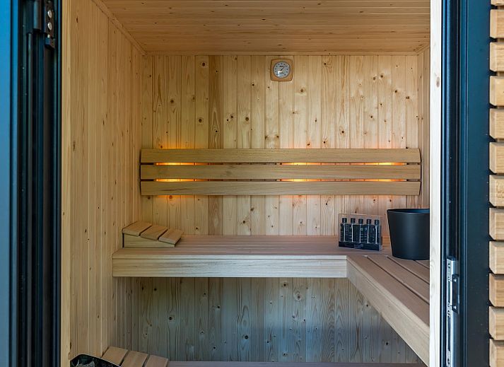 Stilvolles Wohnzimmer des Ferienhauses Blue Harrier in Den Burg, Texel.