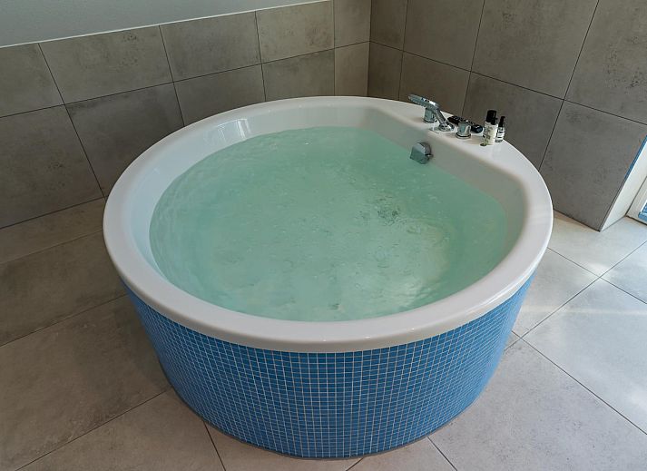 Gemuetliches Wohnzimmer im Ferienhaus Grauwe Kiekendief, Texel.