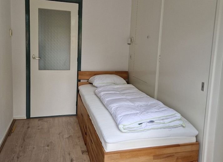 Gemuetliches Wohnzimmer im Ferienhaus Kogerstraat, Den Burg, Texel. Gemuetliche Sitzecke und Essbereich fuer einen entspannten Aufenthalt.