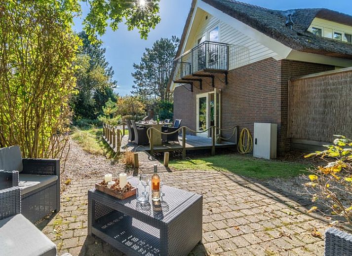 Offener Wohnbereich im Huisje in Den Burg, Ferienhaus auf Texel mit Ess- und Sitzecke.